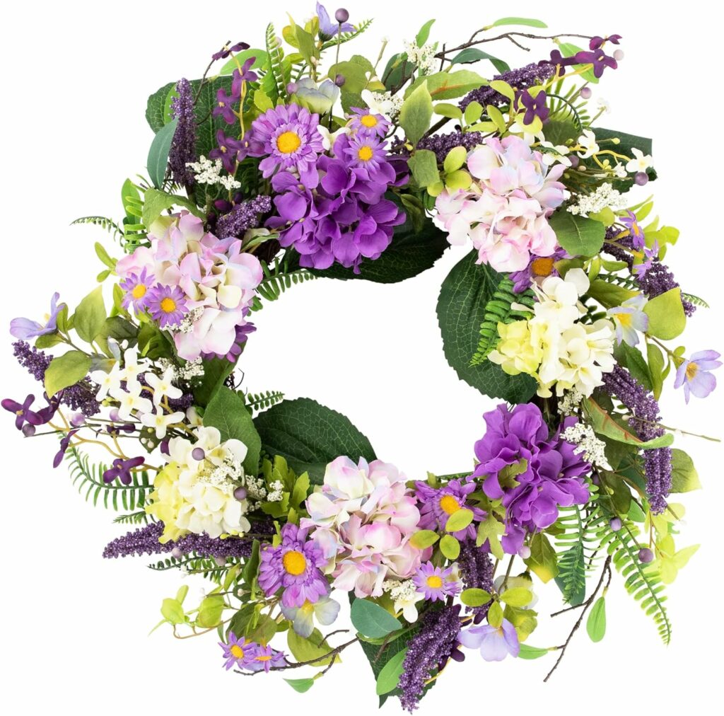 Artificial hydrangea floral arrangement with soft green foliage and spring-inspired blooms styled as a seasonal home decor accent.